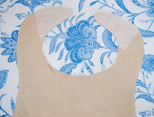 Hvordan sy en babybib med egne hender
