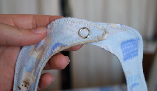 Hvordan sy en babybib med egne hender