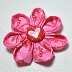 Hvordan lage blomster kanzashi fra et vev med egne hender