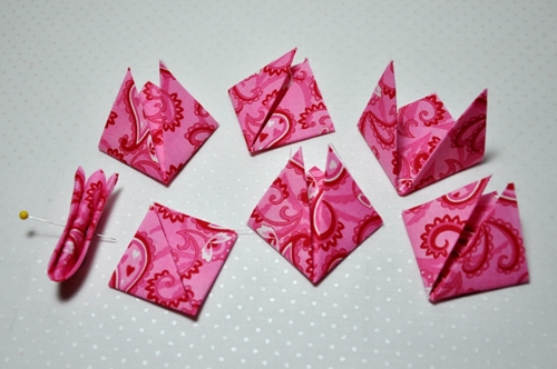 Hvordan lage blomster kanzashi fra et vev med egne hender