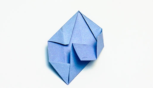 Hvordan lage en origami blomst med egne hender