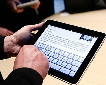 Hvilken er bedre: en nettbrett eller bærbar datamaskin?