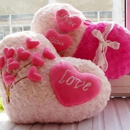 Hva å gi en jente til Valentinsdag: ideer til gaver