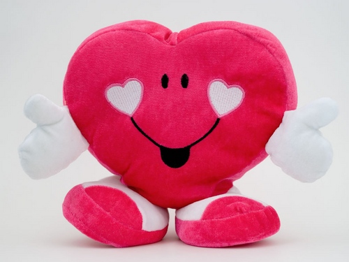 Hva å gi en venn til Valentinsdag: ideer til personliggjørelse