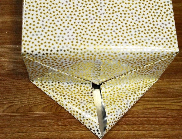 Hvordan pakke en gave i et gavepapir
