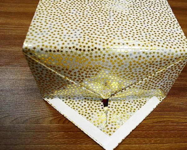 Hvordan pakke en gave i et gavepapir
